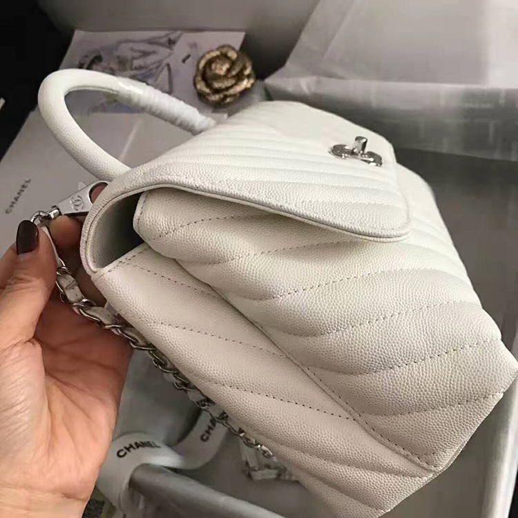 2020 Chanel flap bag with top handle