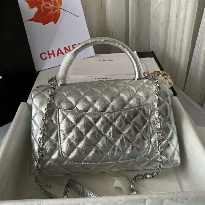 2020 Chanel flap bag with top handle