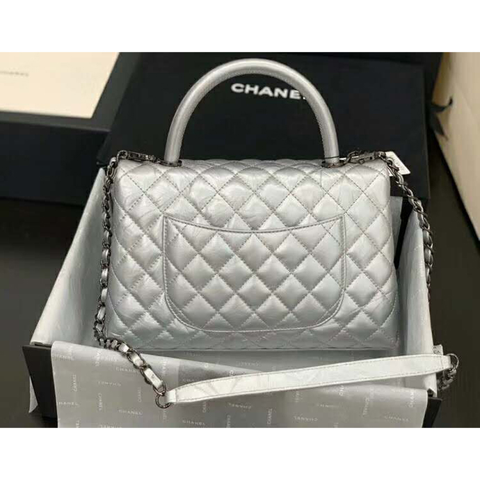 2020 Chanel flap bag with top handle