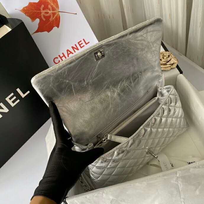 2020 Chanel flap bag with top handle