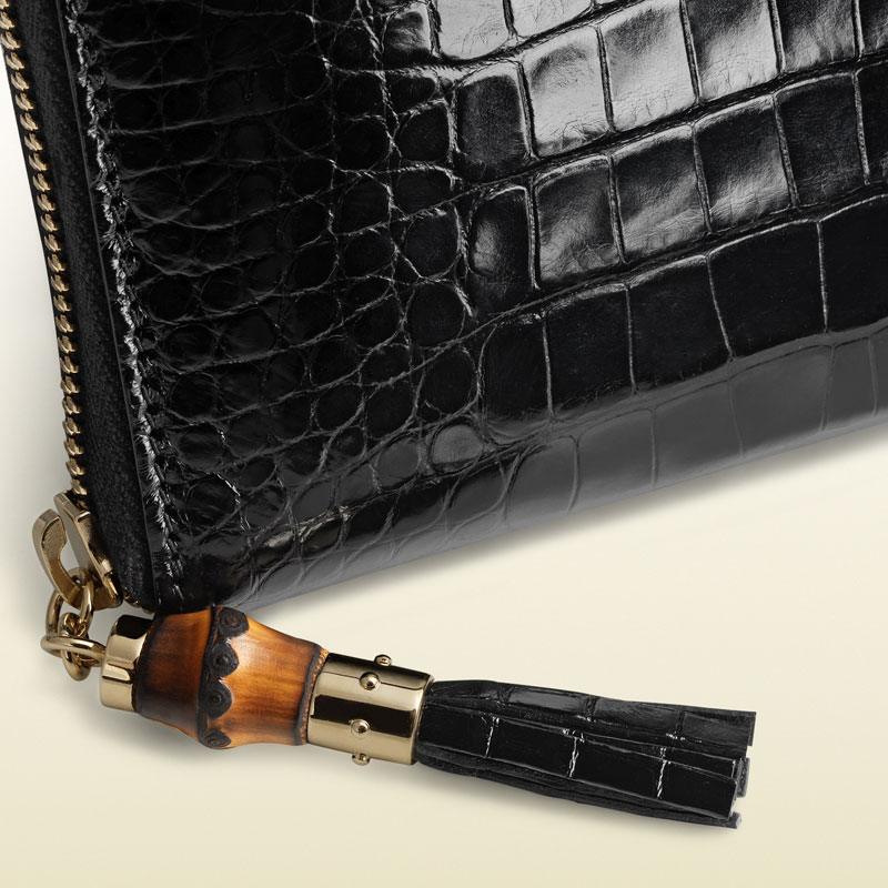 Gucci bamboo tassel crocodile zip around wallet