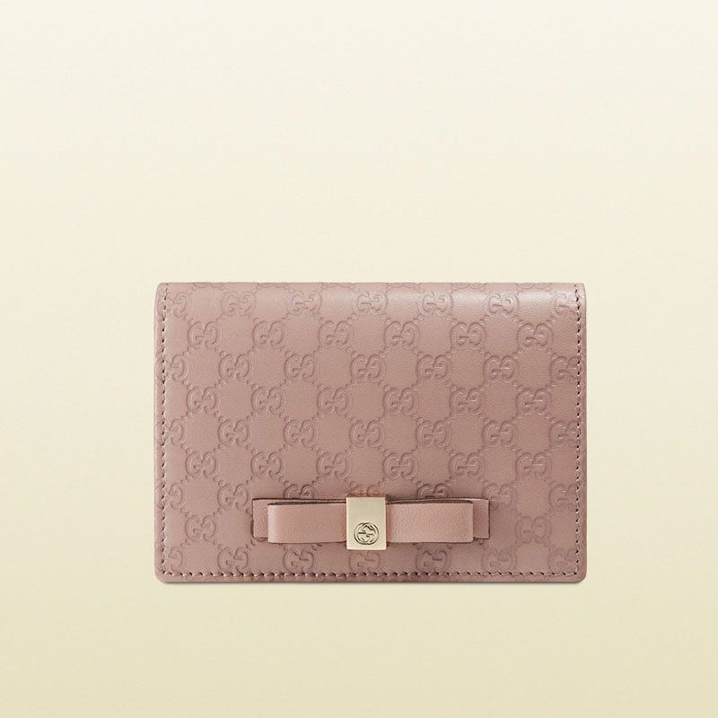 Gucci bow microguccissima leather train pass case