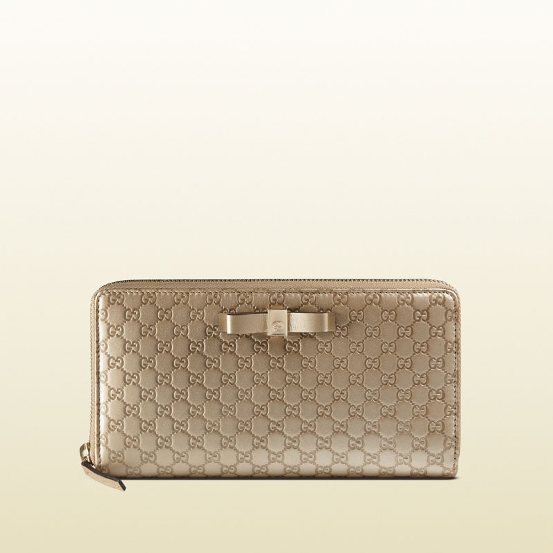 Gucci bow microguccissima leather zip around wallet