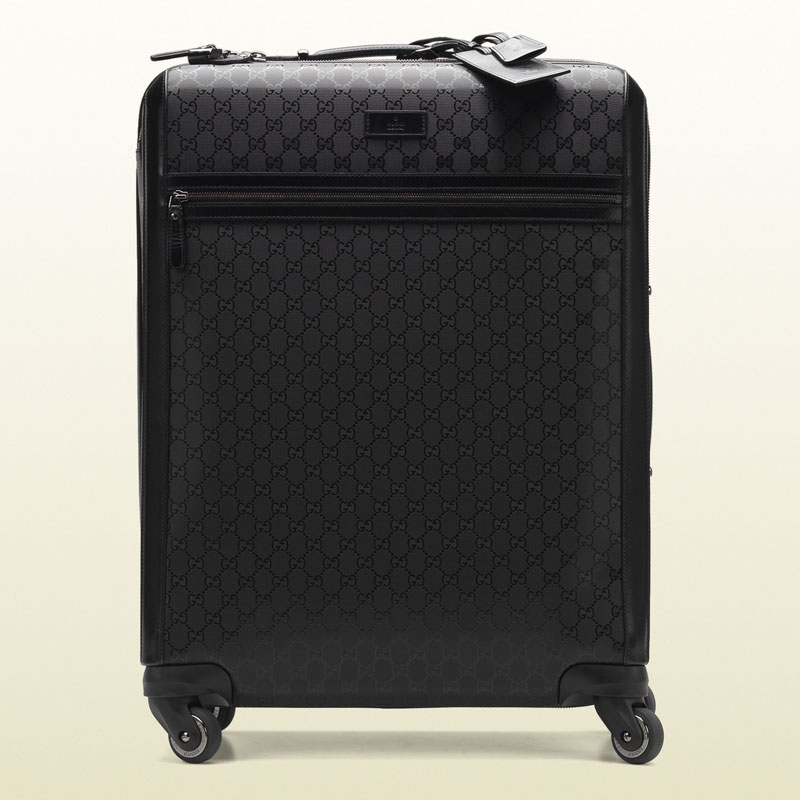 Gucci four wheel suitcase