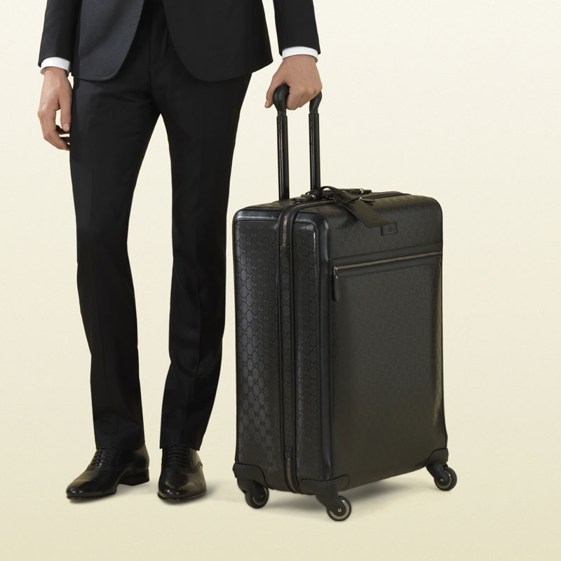 Gucci four wheel suitcase