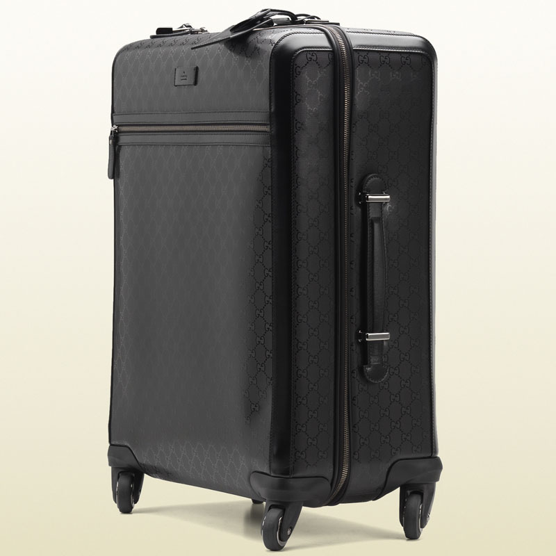 Gucci four wheel suitcase