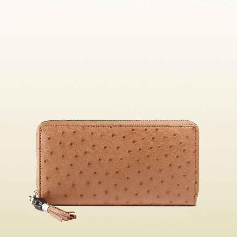 Gucci ostrich zip around wallet