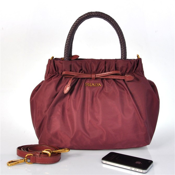 Prada waterproof nylon handbag in Claret