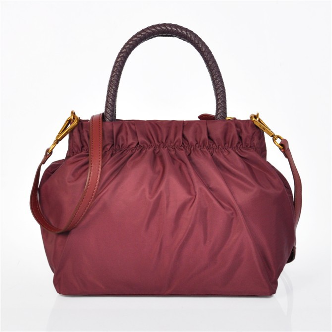 Prada waterproof nylon handbag in Claret