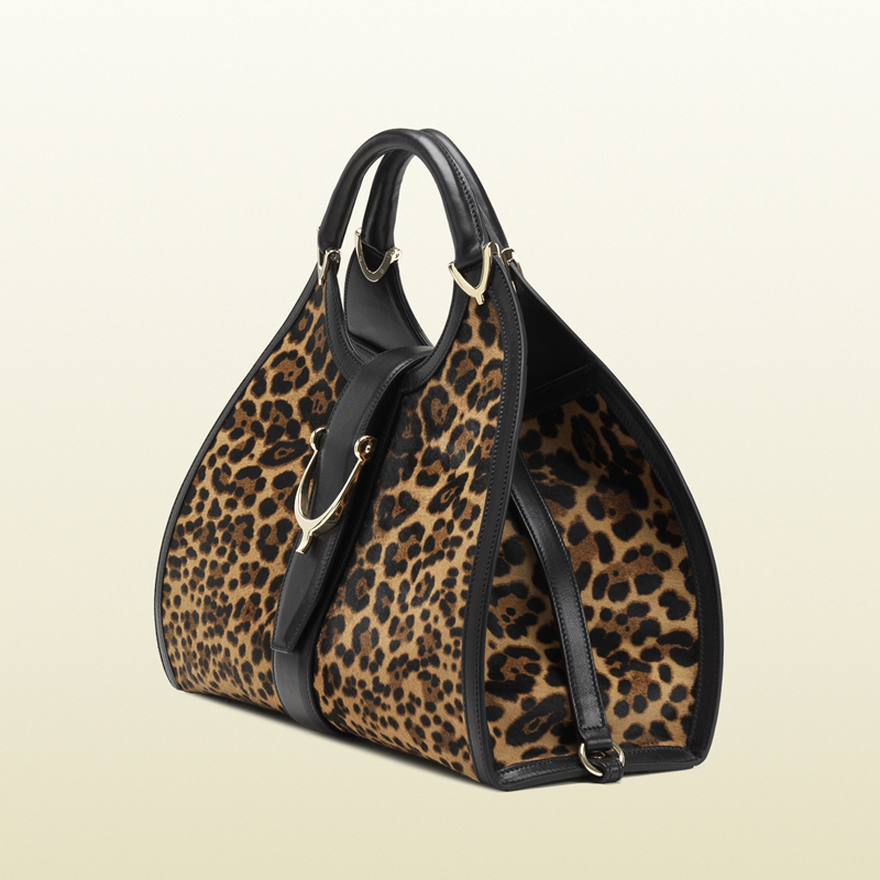 Stirrup jaguar print top handle bag