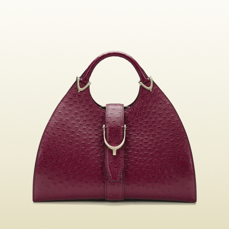 Stirrup raspberry ostrich top handle bag