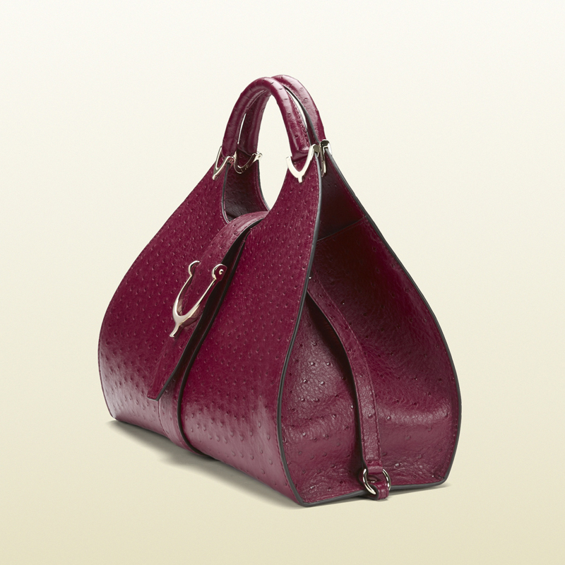 Stirrup raspberry ostrich top handle bag