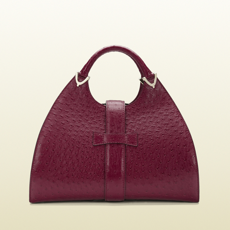 Stirrup raspberry ostrich top handle bag