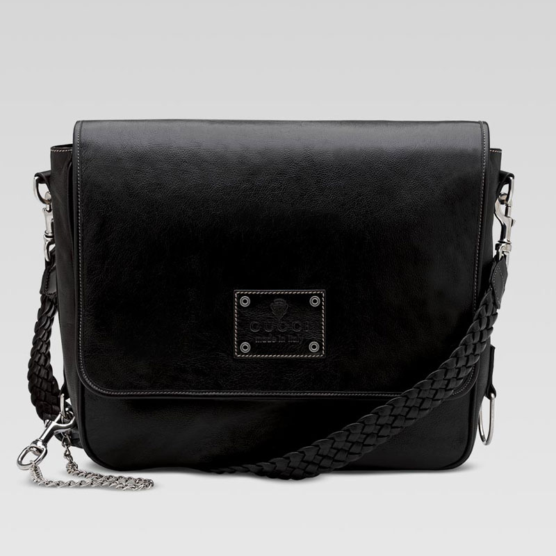 large messenger bag with gucci crest trademark and