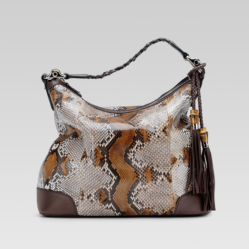 eva hobo with woven leather, tassels, and bamboo detail