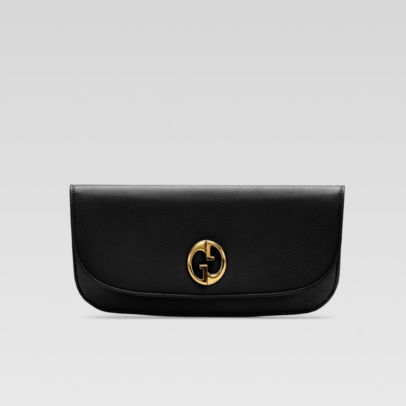 'gucci 1973' clutch with oval GG ornament