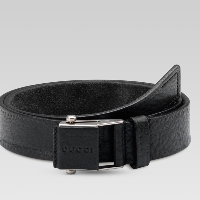 slider belt with embossed gucci logo