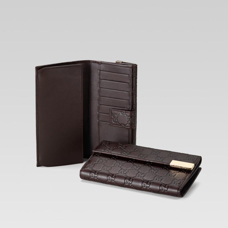 continental wallet with gucci trademark engraved metal plate