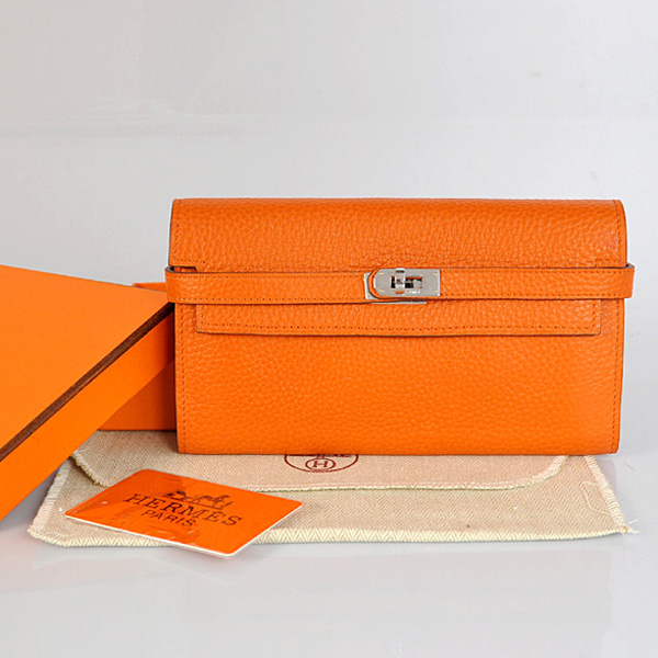 Hermes Kelly Wallet clemence leather in Orange