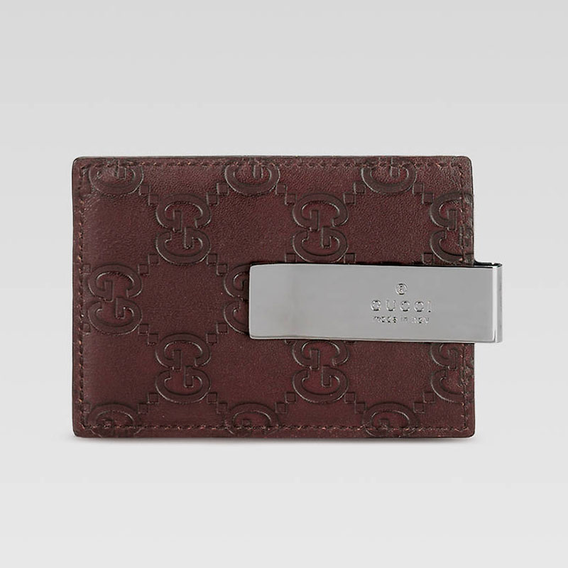 money clip wallet with engraved gucci trademark on