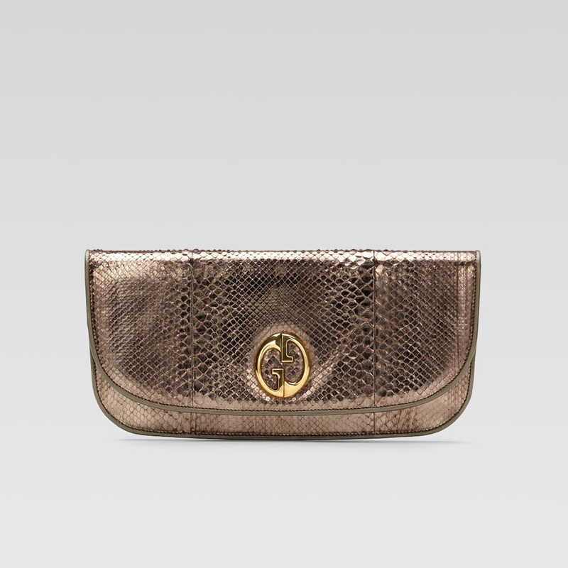 'gucci 1973' clutch with oval GG ornament