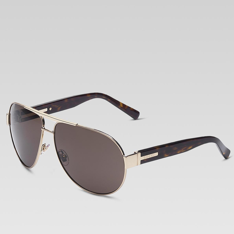 large aviator frame sunglasses with gucci logo on