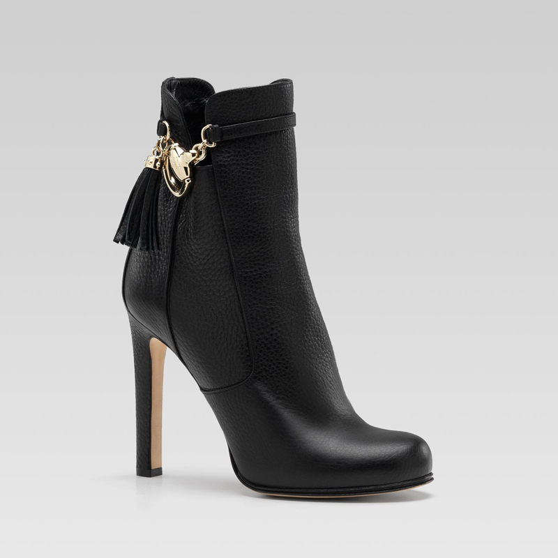 'sienna' high heel bootie with tassel and horsebit detail