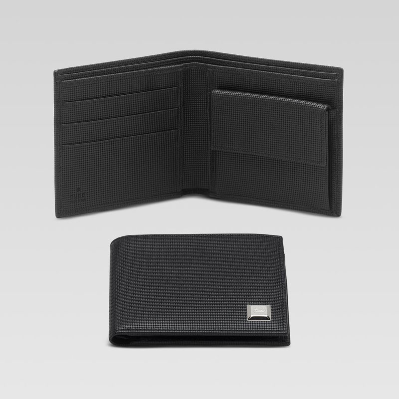 bi-fold wallet with engraved gucci script nail det