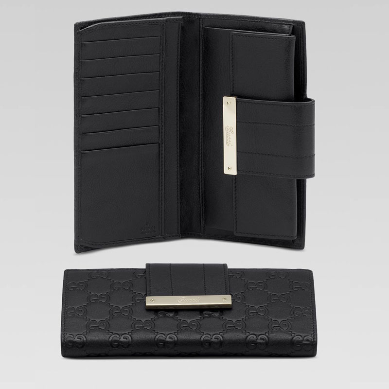 continental wallet with engraved gucci script logo