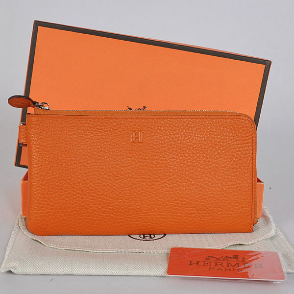 Hermes Zipper Wallet clemence leather in Orange