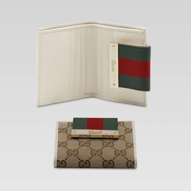 mini wallet with engraved gucci script logo