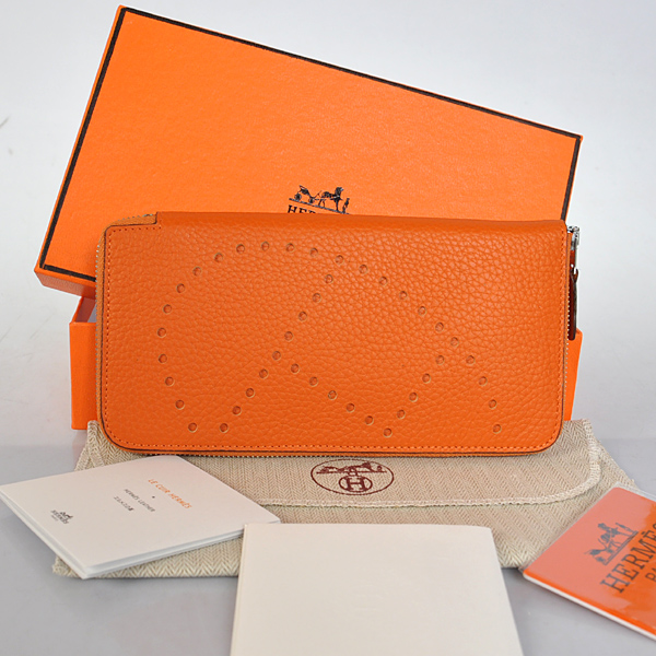 Hermes Evelyn Wallet clemence leather in Orange