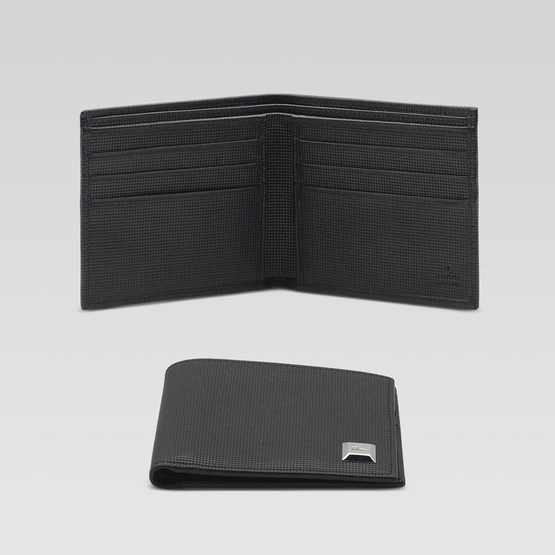 bi-fold wallet with engraved gucci script nail det