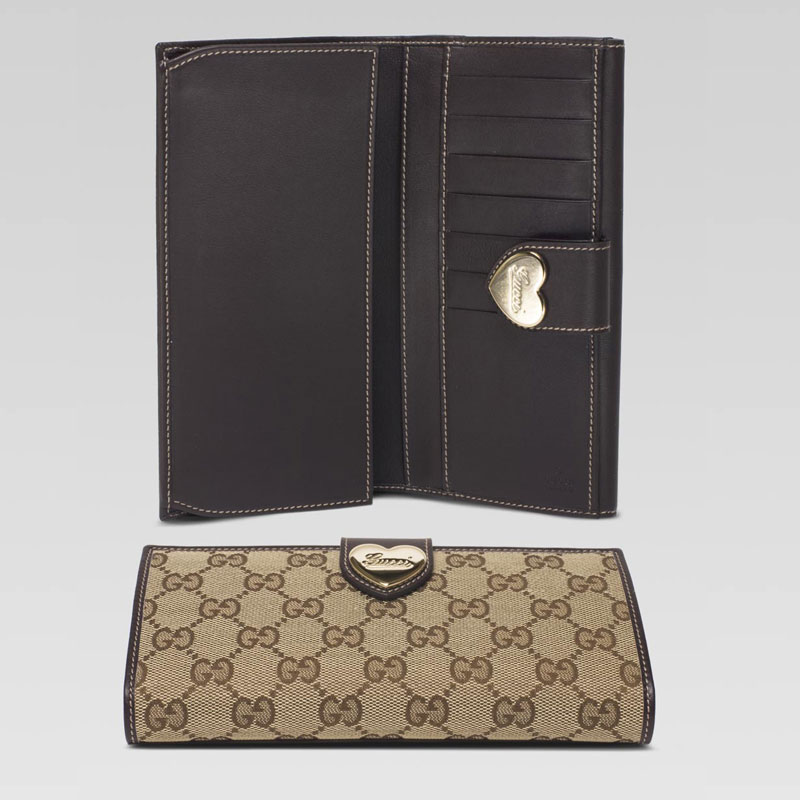 continental wallet with engraved gucci script hear