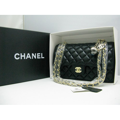 Chanel lambskin leather Black Flap bag with Gold chain