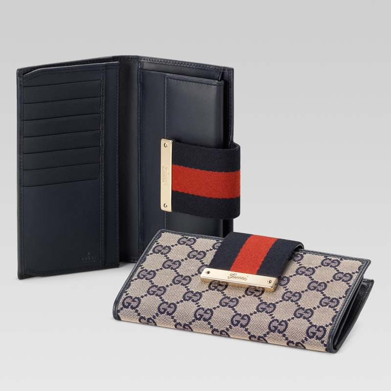 continental wallet with engraved gucci script logo