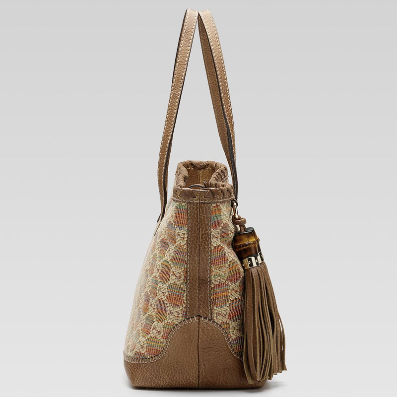 'tassels' medium tote with hand stitching and tass