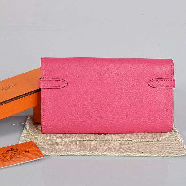 Hermes Kelly Wallet clemence leather in Peach