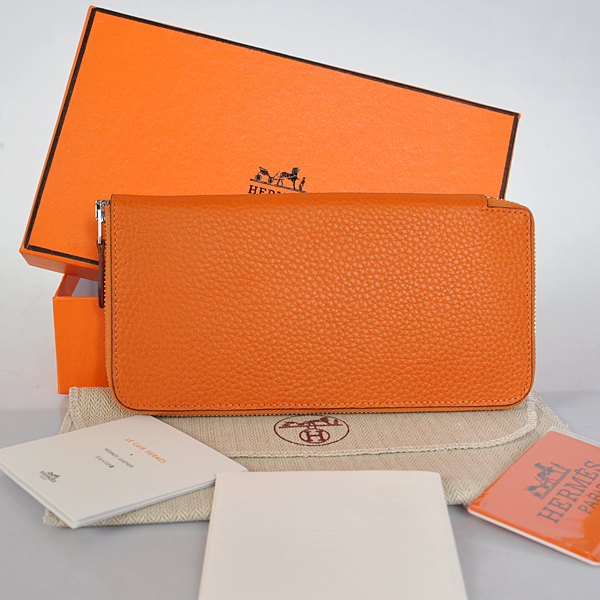 Hermes Evelyn Wallet clemence leather in Orange