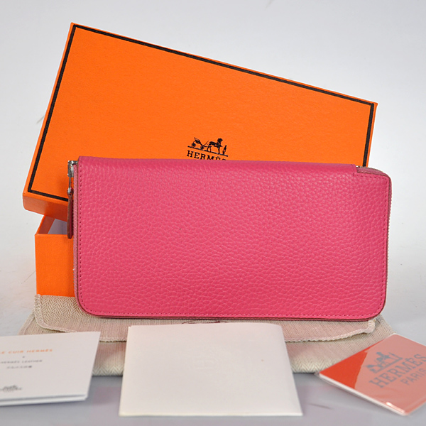 Hermes Evelyn Wallet clemence leather in Peach