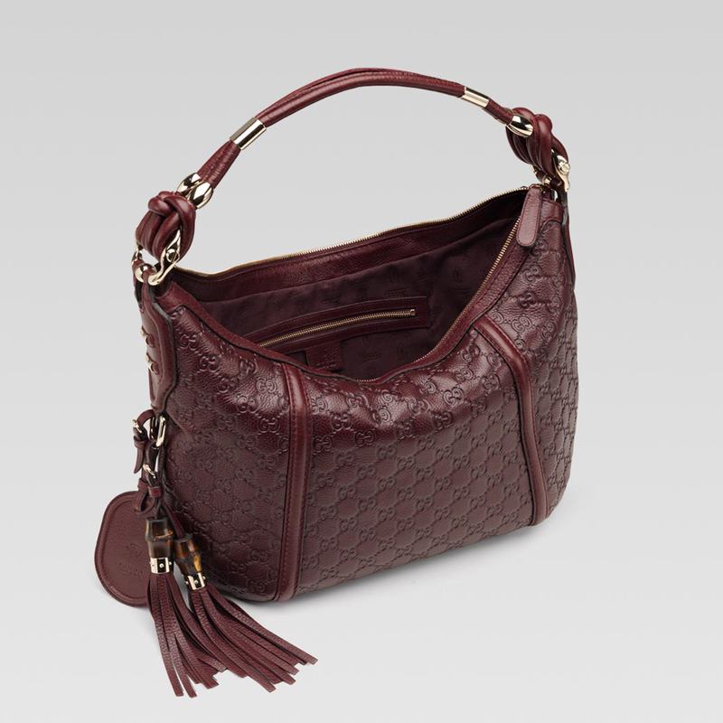 'techno horsebit' medium hobo with tassels