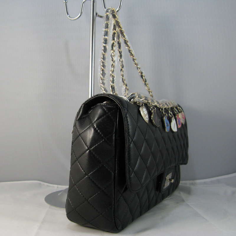 Chanel Black lambskin leather Flap Bag with Gold chain