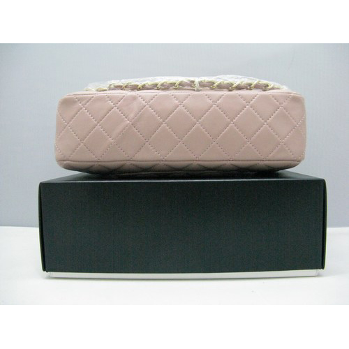 Chanel lambskin leather Pink Flap bag with Gold chain