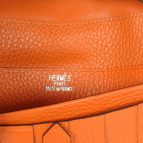 Hermes 2 fold wallet clemence leather in Orange