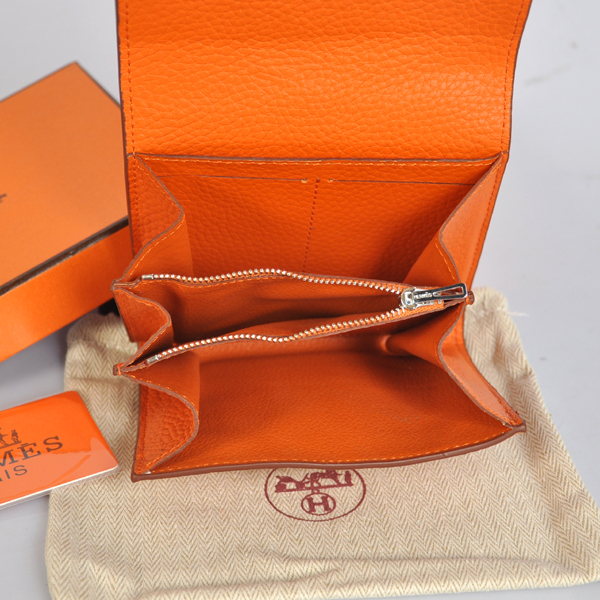 Hermes Constance Wallet clemence leather in Orange