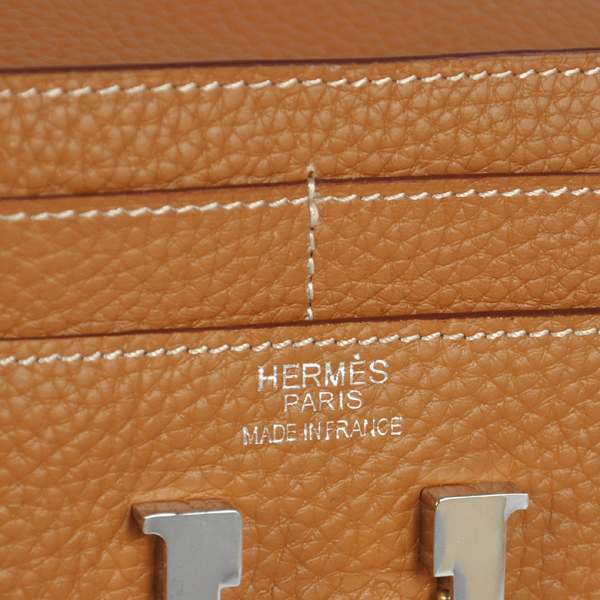 Hermes Constance Wallet clemence leather in Camel