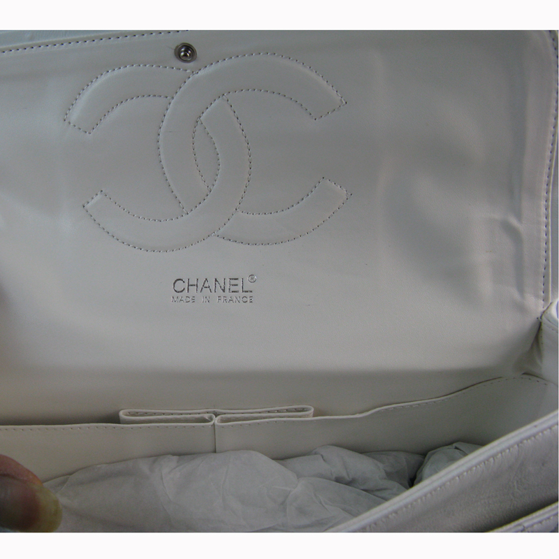 Chanel White color with Silver chain