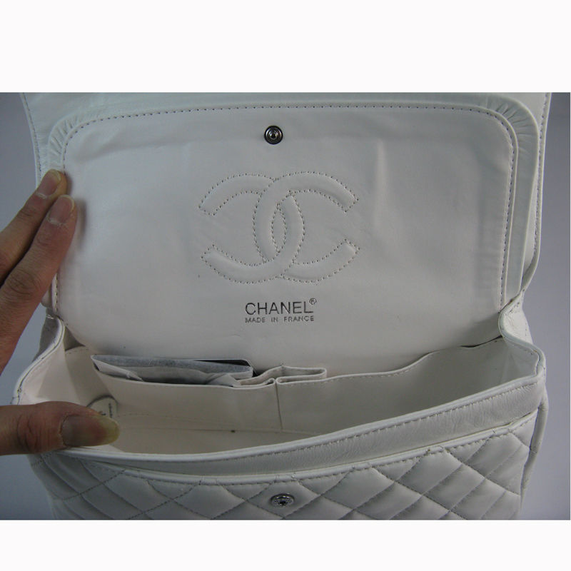 Chanel White color with Silver chain