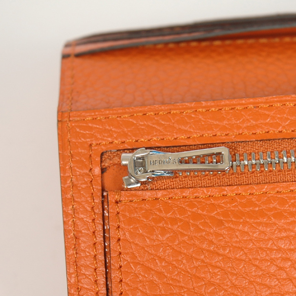 Hermes 2 fold wallet clemence leather in Orange